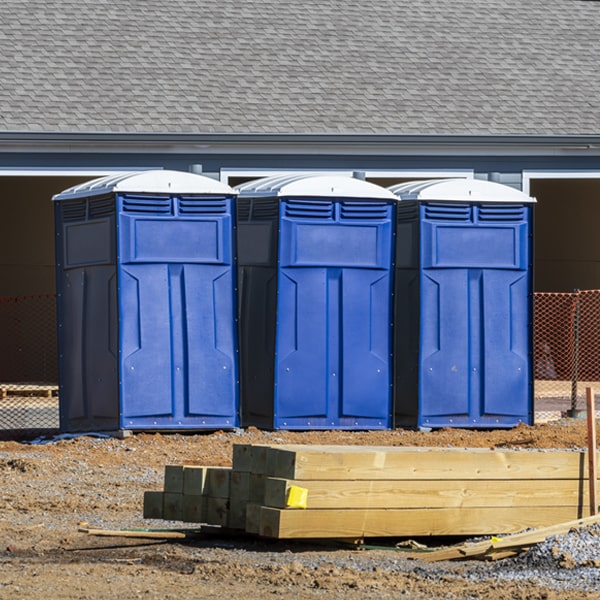 how often are the porta potties cleaned and serviced during a rental period in Quinnesec Michigan